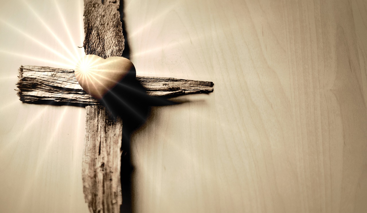 cross with shining heart